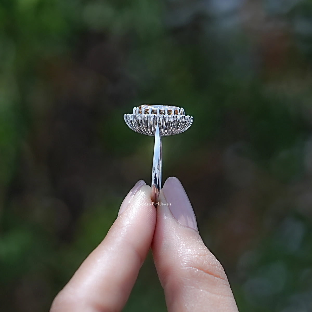 Side View of Oval Cut Moissanite Halo Engagement Ring
