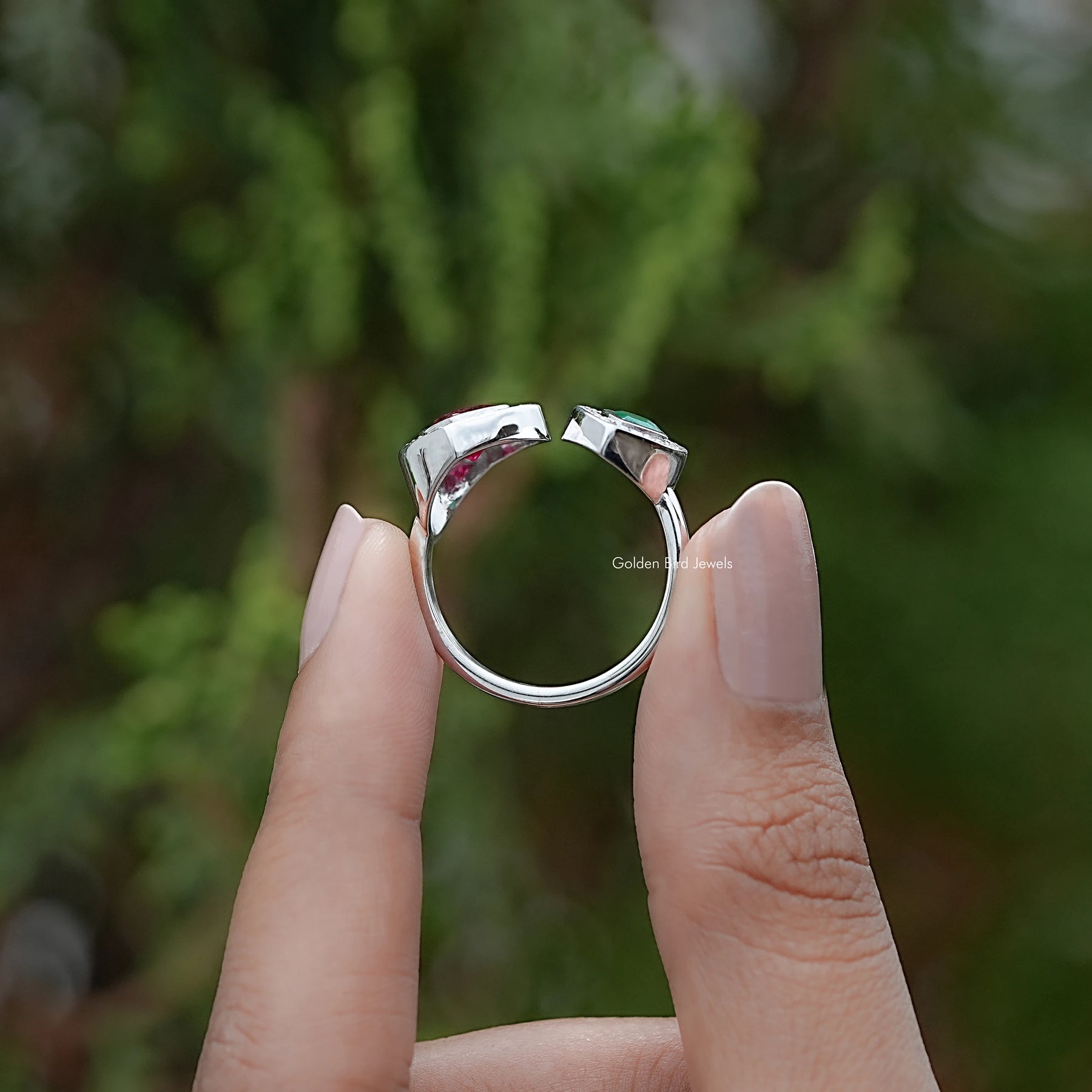 Back view of Pear And Heart Cut Moissanite Solitaire Ring in secure setting