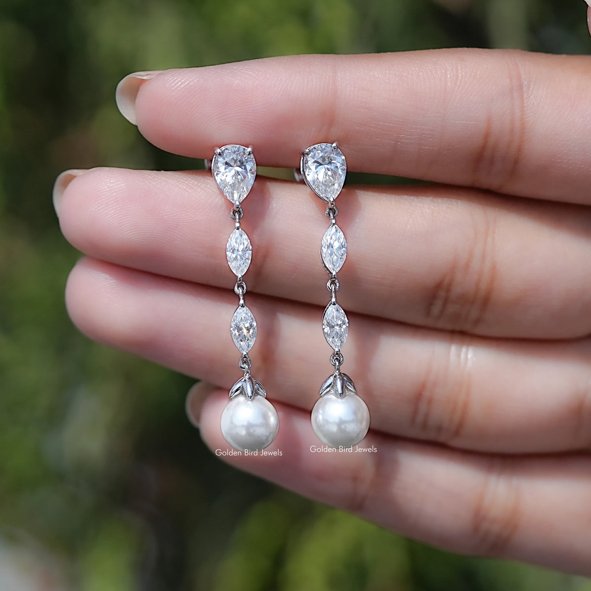 close view of Pear And Marquise Cut Moissanite Stud Earrings