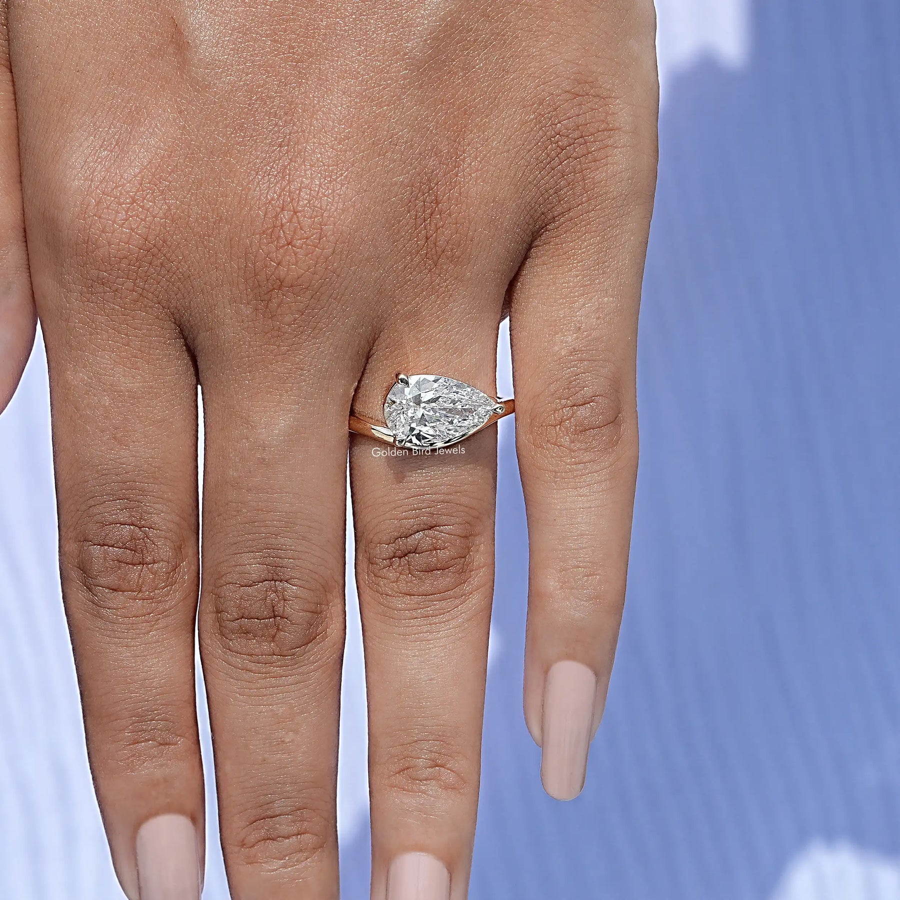 Close view of Pear Cut Lab Diamond Halo Ring
