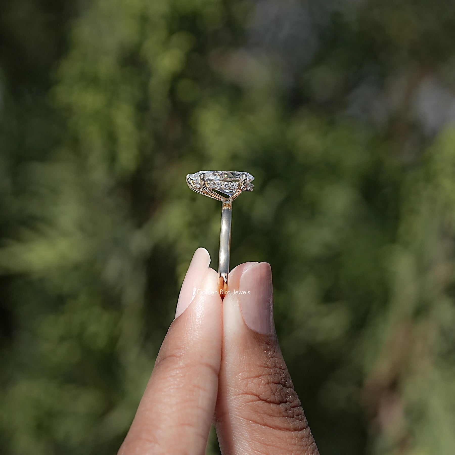 Side View of Pear Shaped Lab Diamond Halo Ring