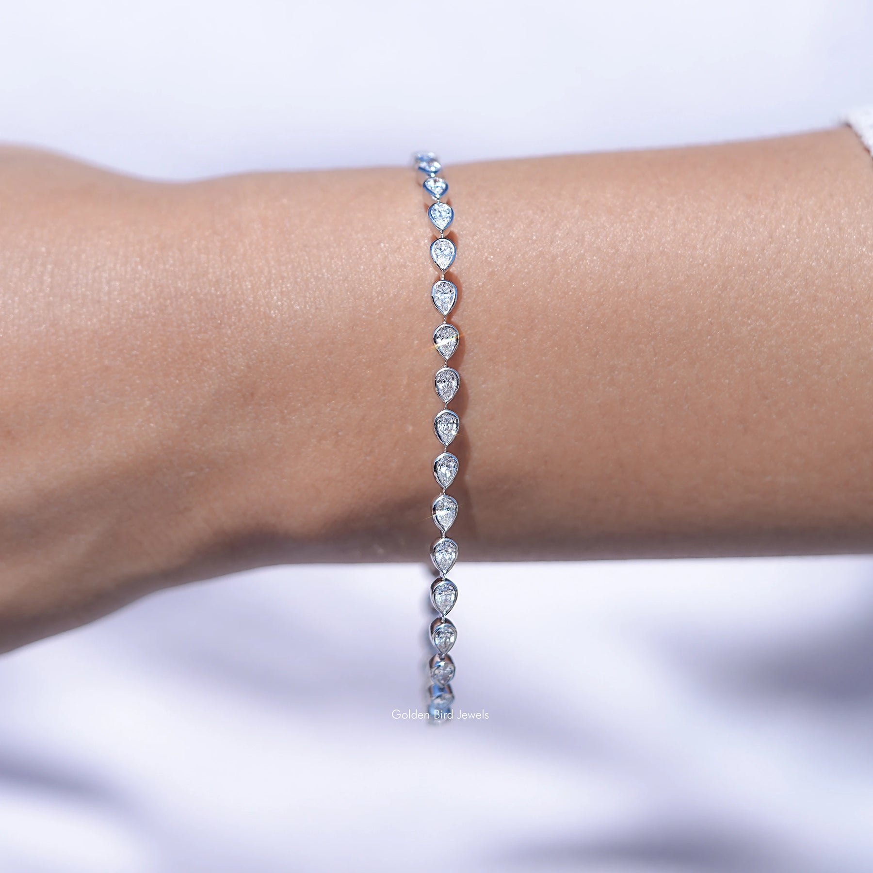 Pear Shaped Lab Diamond Bezel Set Tennis Bracelet