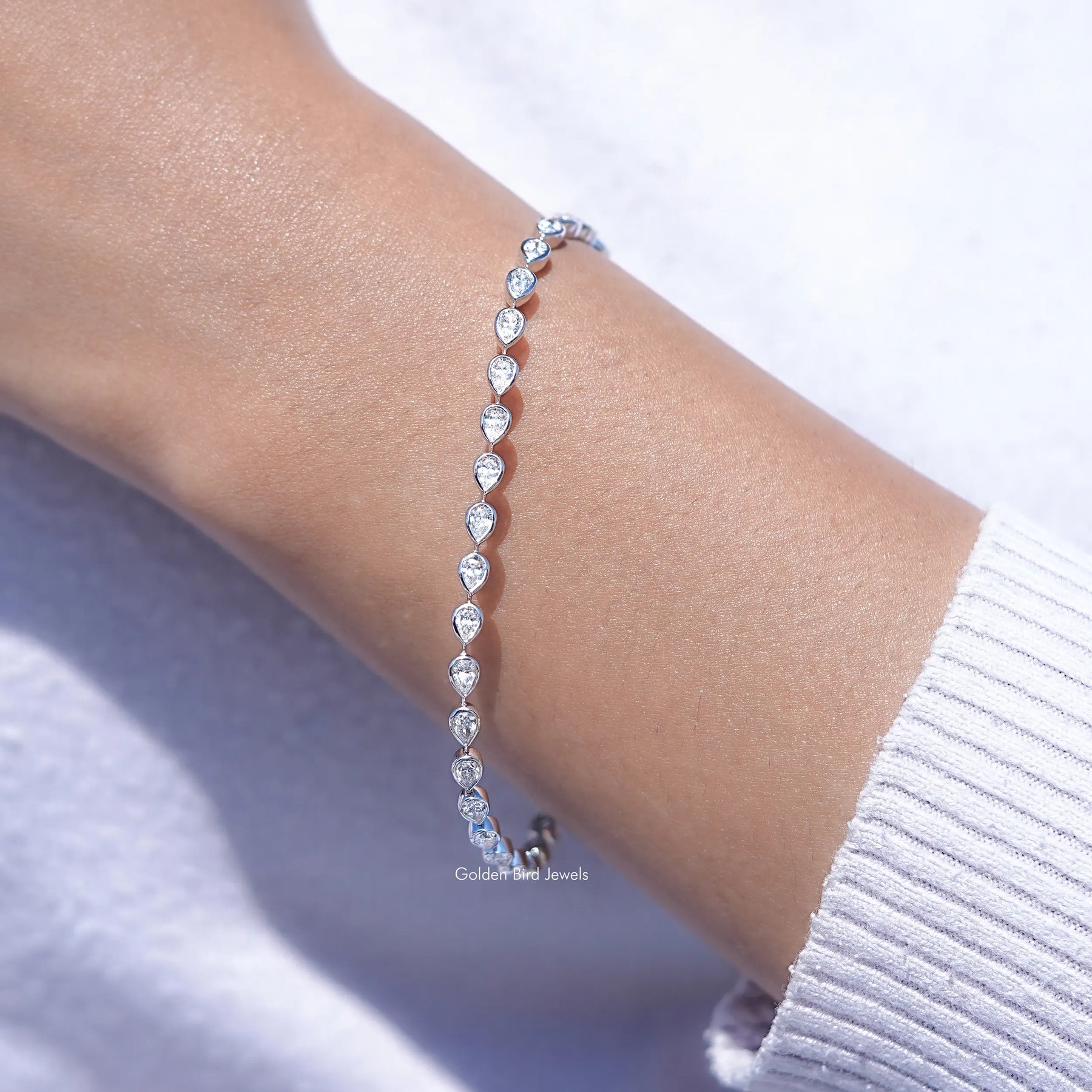 Pear Shaped Lab Diamond Bezel Set Tennis Bracelet