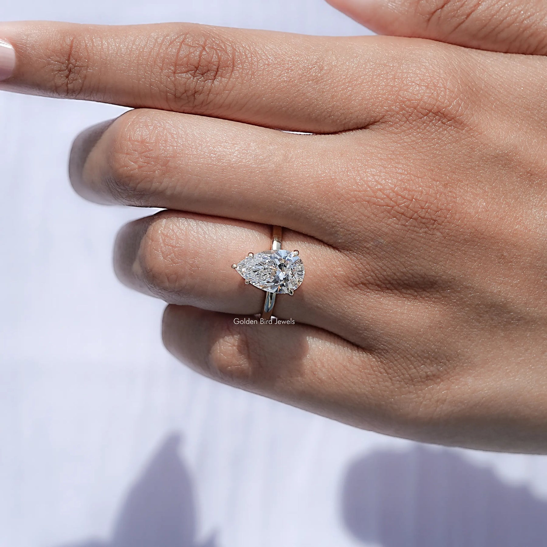 Detailed view of Pear Shaped Lab Diamond Hidden Halo Ring