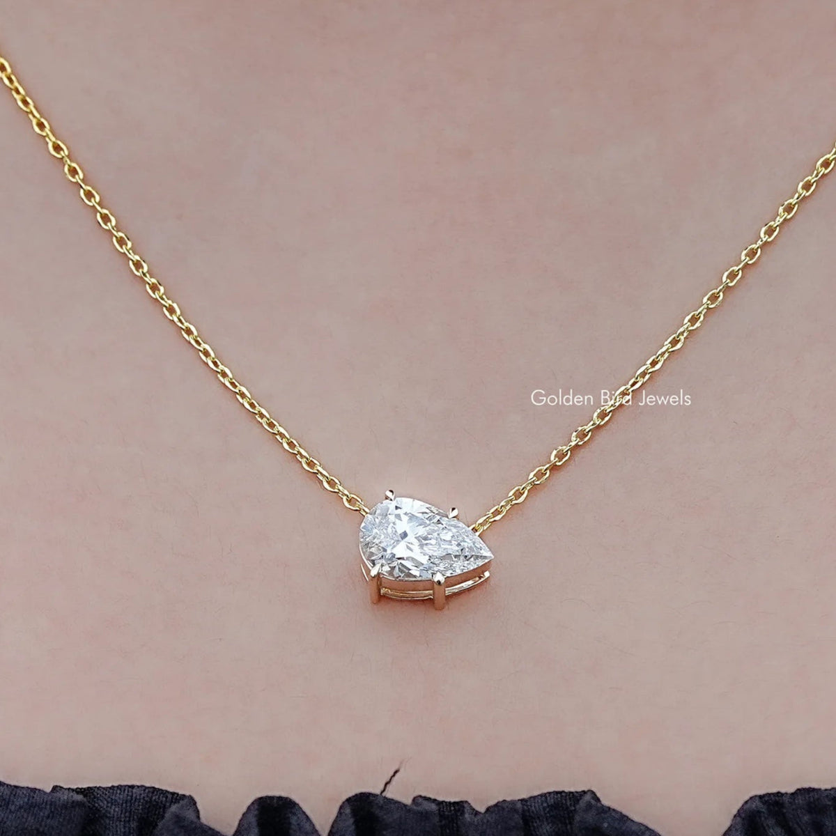Close up view of Pear Shaped Lab Diamond Solitaire Pendant