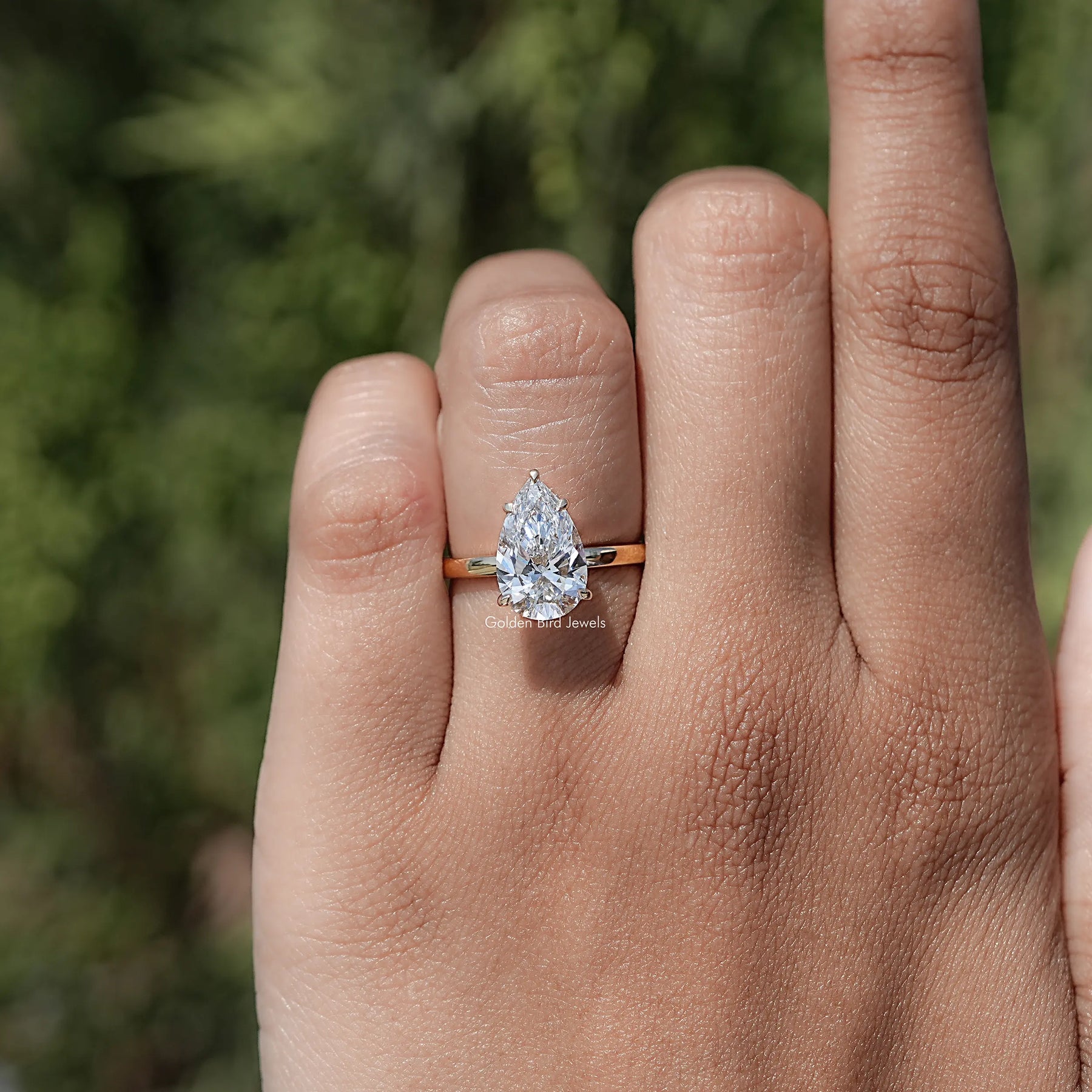 Front view of Pear Shaped Lab Diamond Hidden Halo Ring
