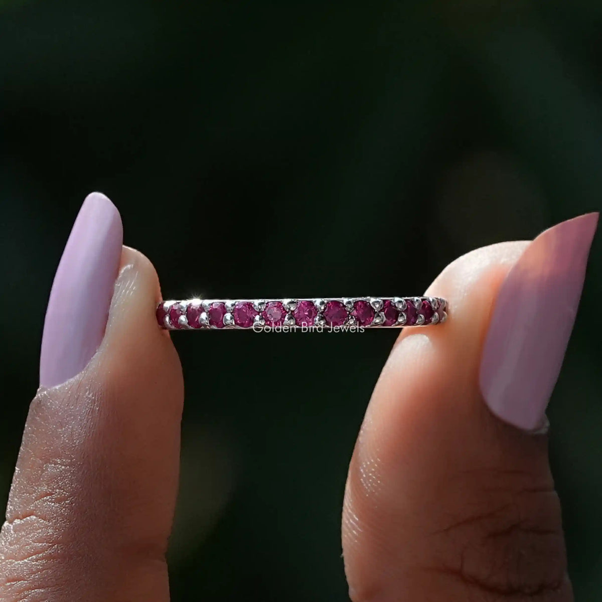Front view of October Birthstone Pink Tourmaline Round Eternity Band