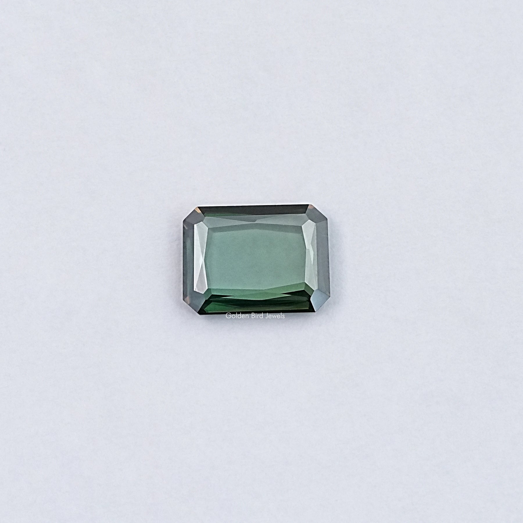 View Of Portrait Cut Emerald Loose Moissanite