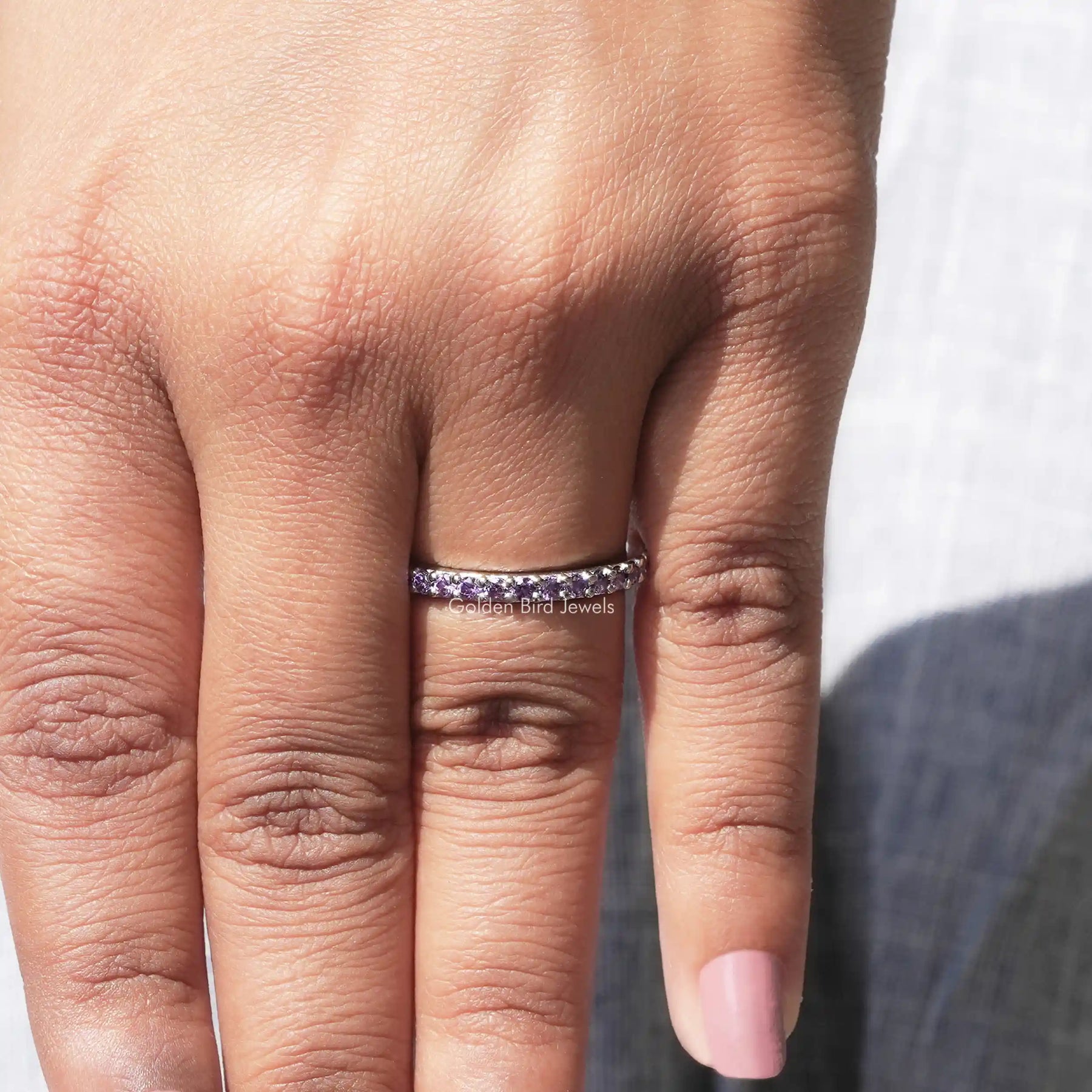 View of Round Cut Moissanite Solitaire Ring in prongs setting