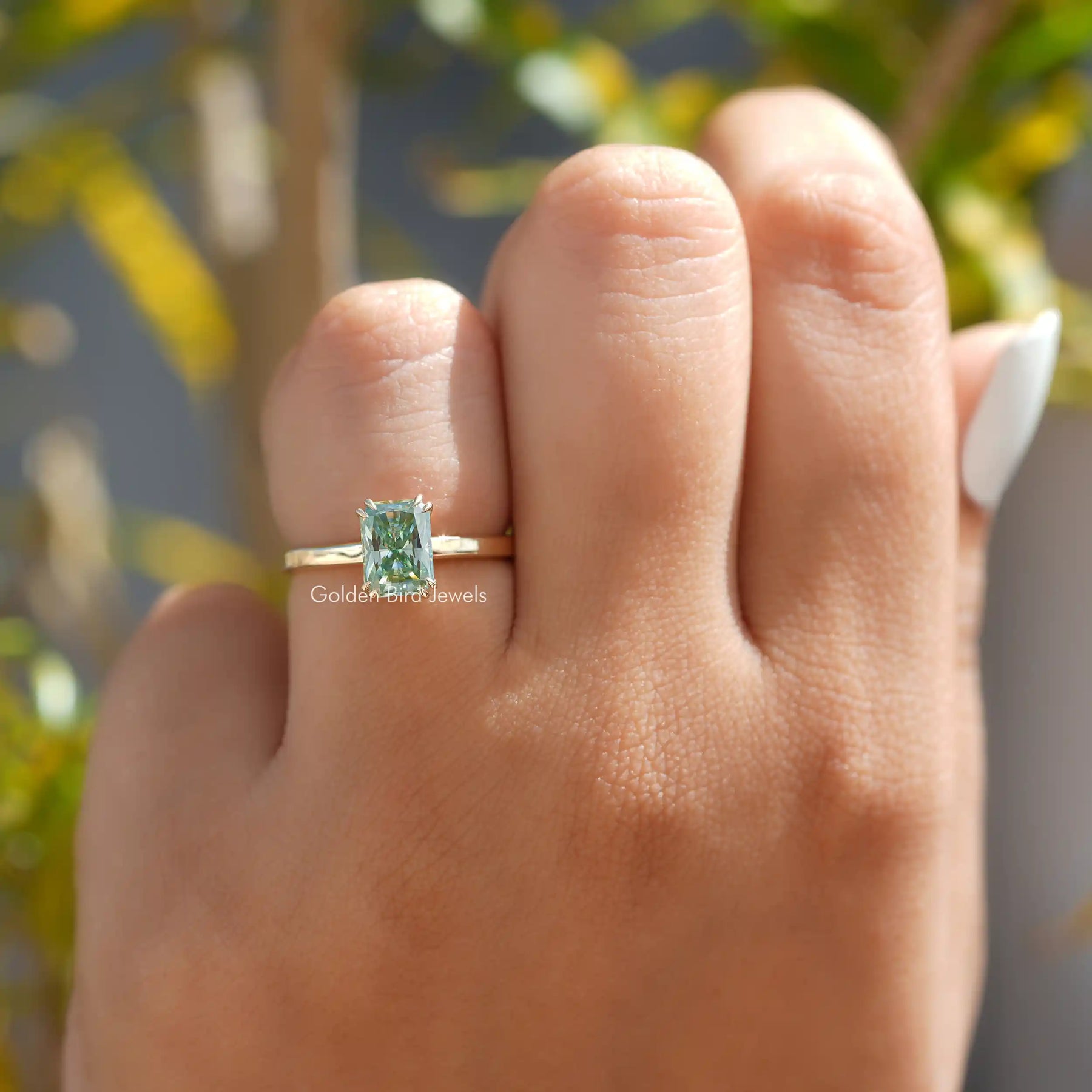 Clear View of Radiant Cut Solitare Engagement Ring In a Yellow Gold