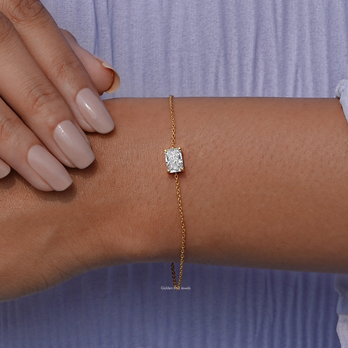 In hand view of Radiant diamond chain bracelet