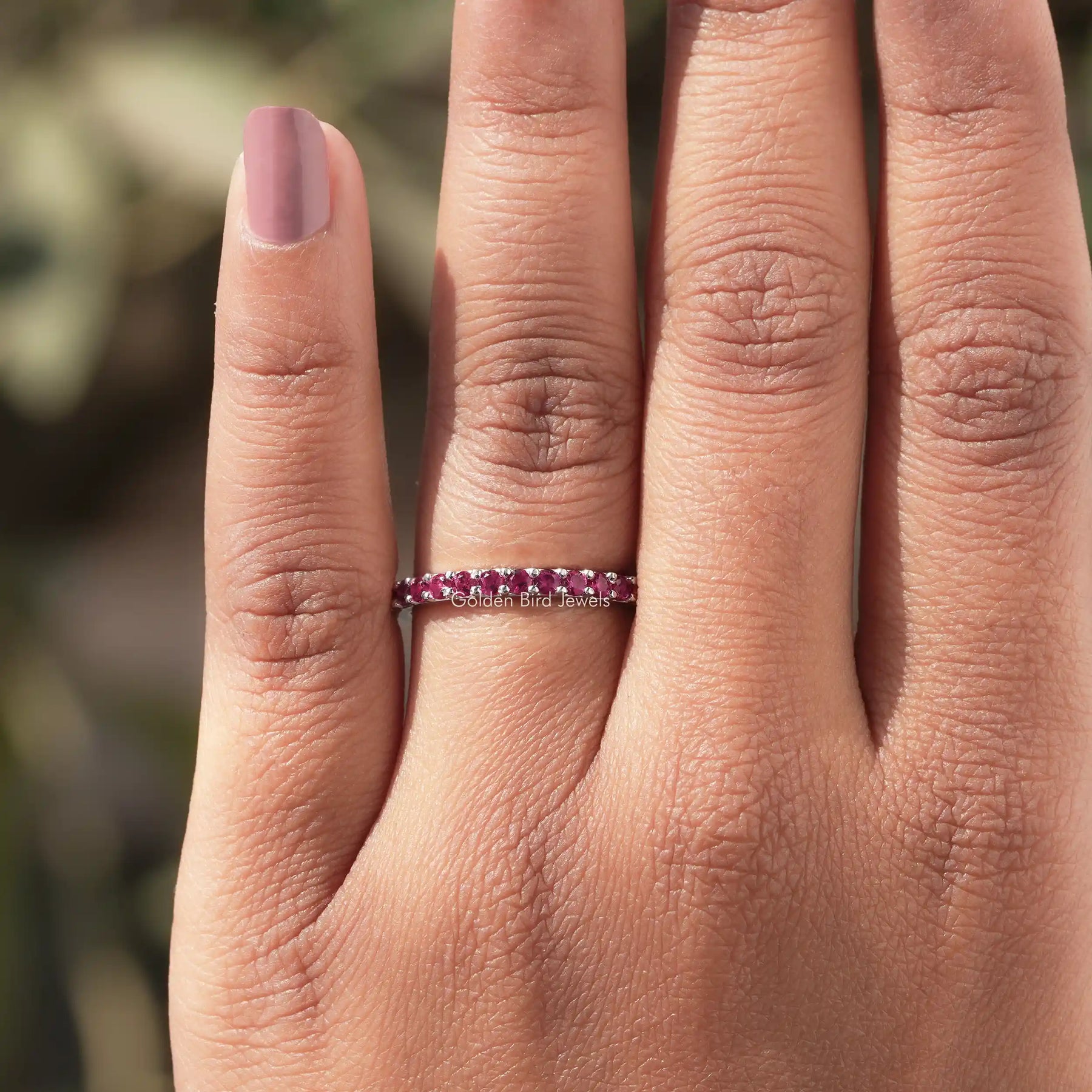 In finger view of Round Cut Moissanite Solitaire Ring