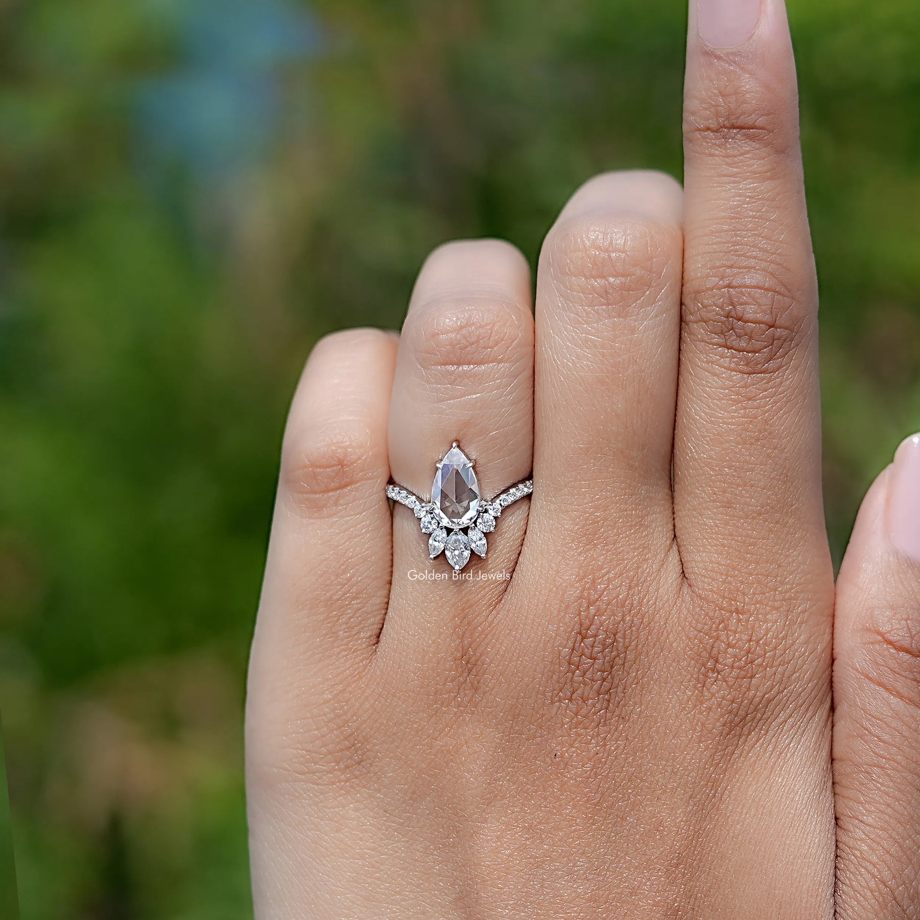 In finger front view of Rose Cut Moissanite engagement ring