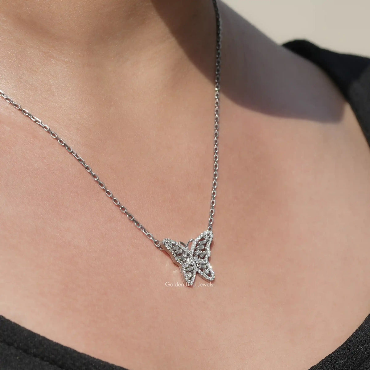 In neck view of round cut moissanite halo pendant