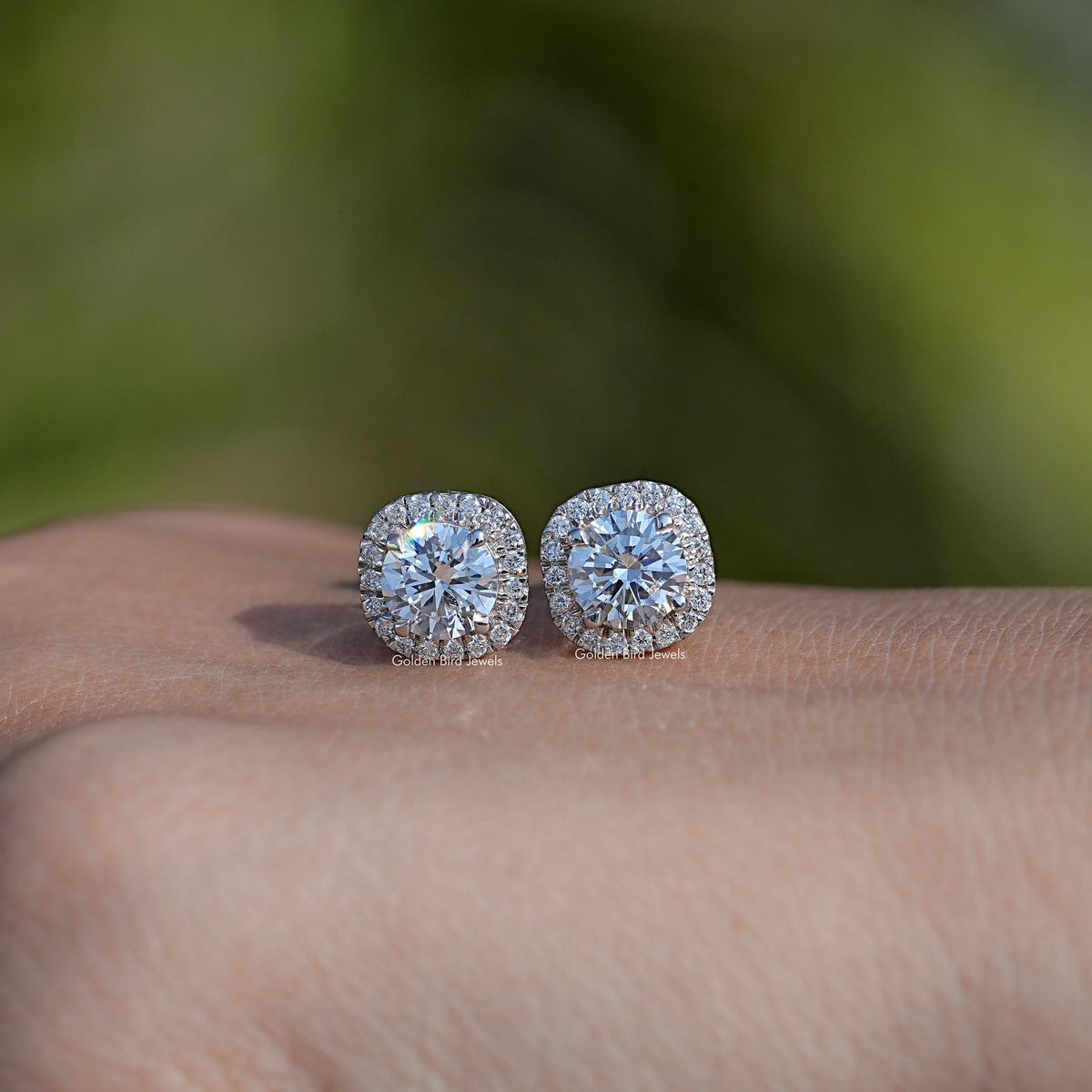 View of Round Cut Diamond Halo Stud Earrings In White Gold