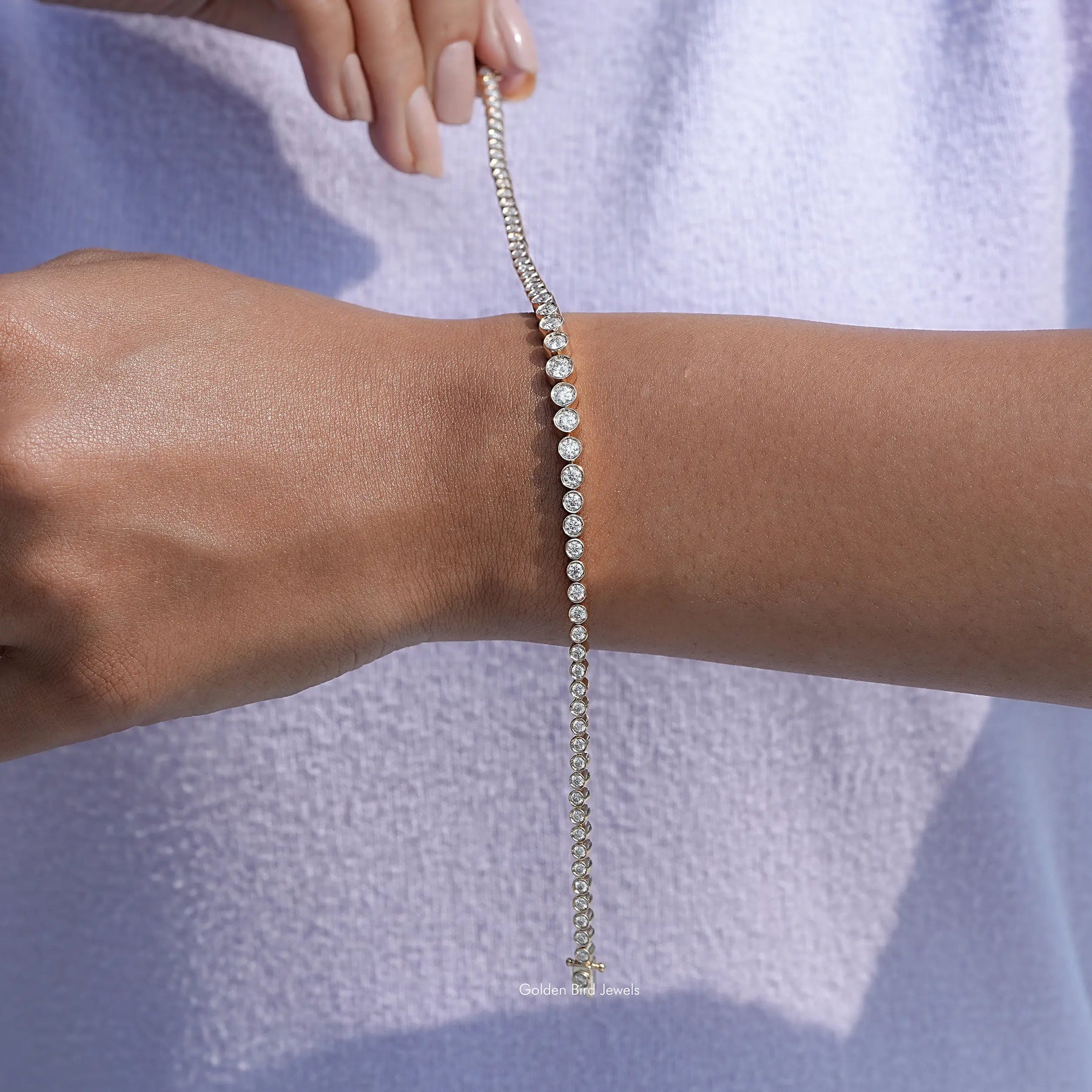 Detailed view of graduated moissanite bracelet