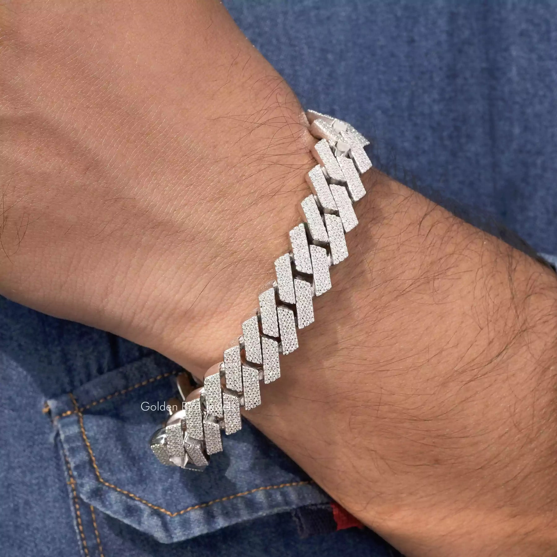 In hand view of round cut moissanite halo bracelet