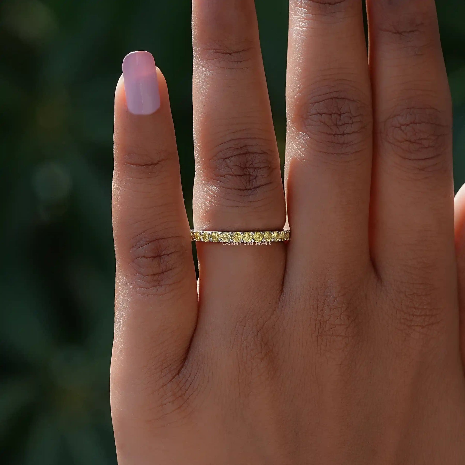 Close view of Citrine Yellow Round Eternity Band