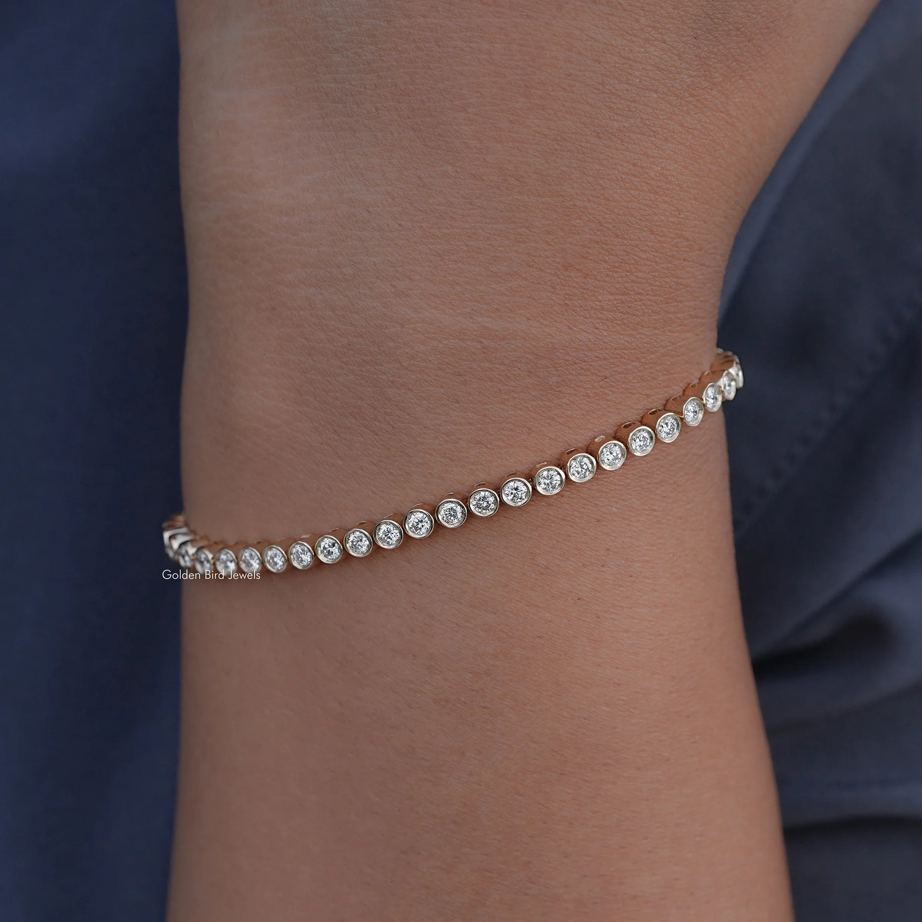 In Hand view of Bezel Setting Round Shaped Tennis Bracelet