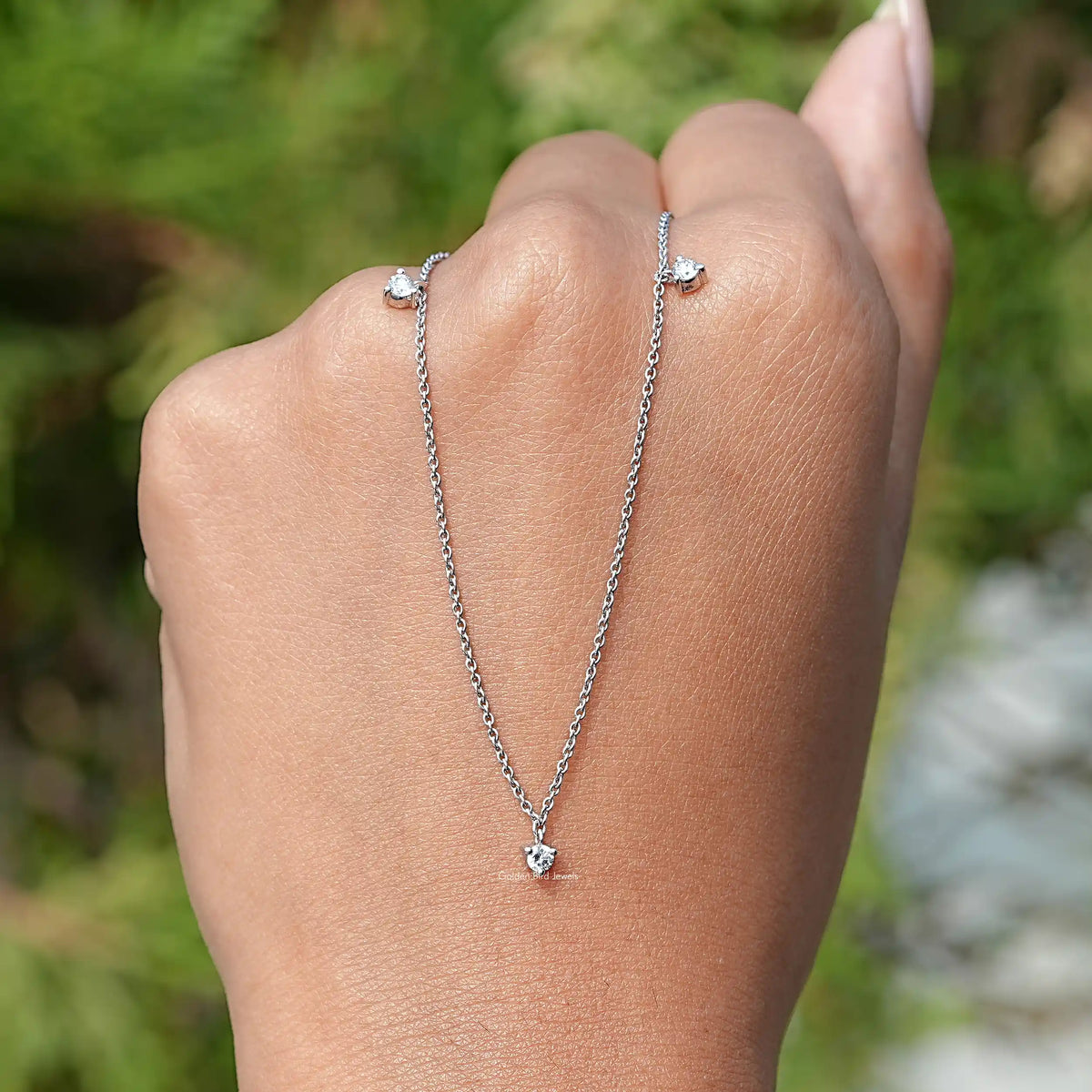 In Hand Holding In the Round Cut Diamond Necklace In White Gold