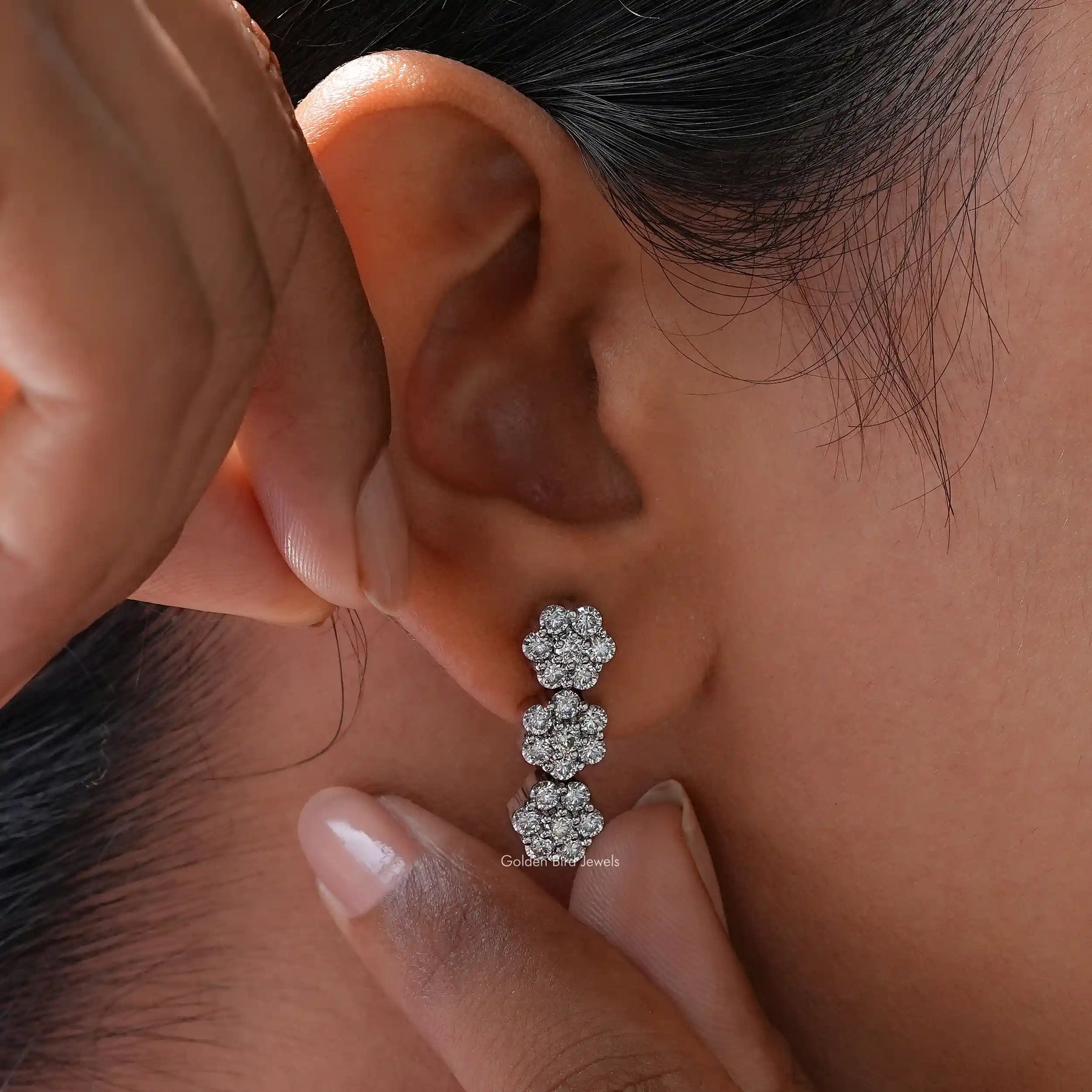 Detailed view of Flower style cluster earrings