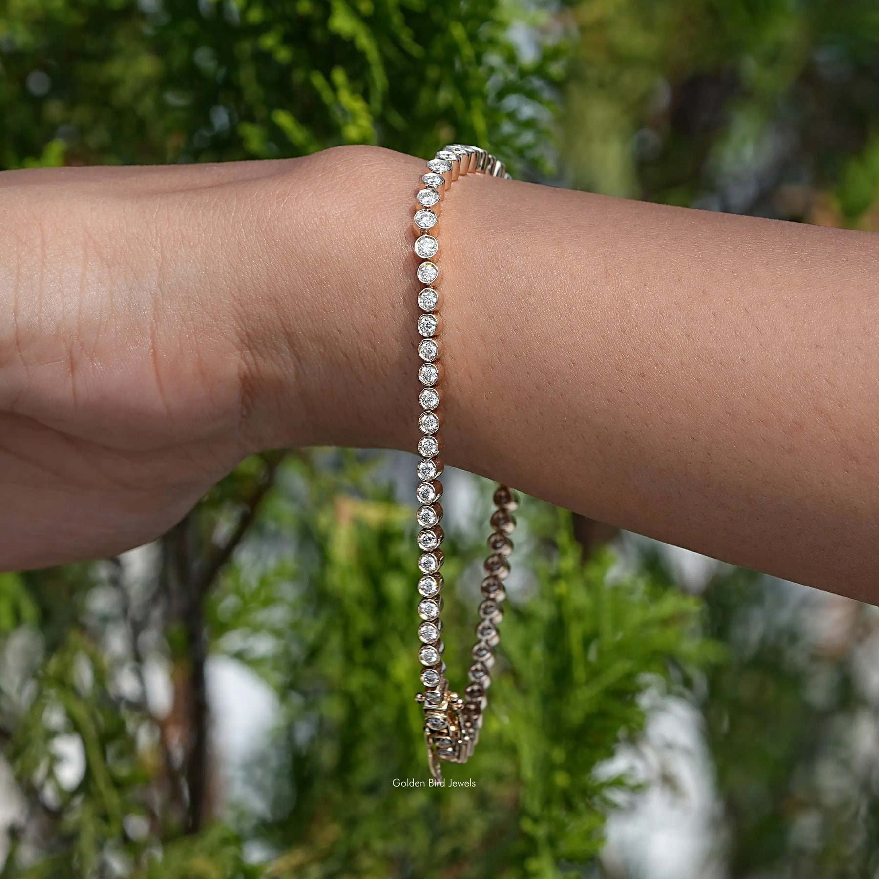 Side view of Moissanite Round Cut Tennis Bracelet In White Gold
