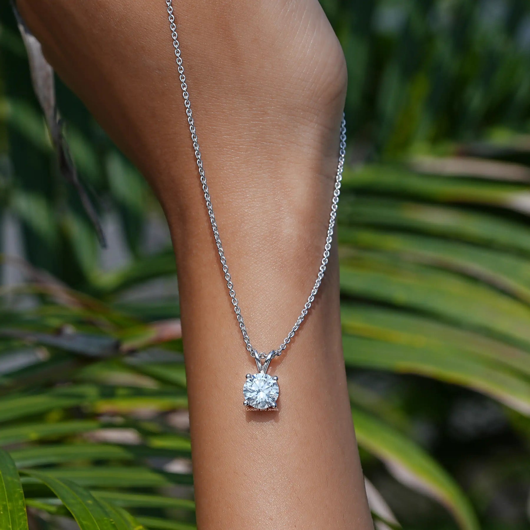 In Hand Showing View Of Round Cut Diamond Pendant