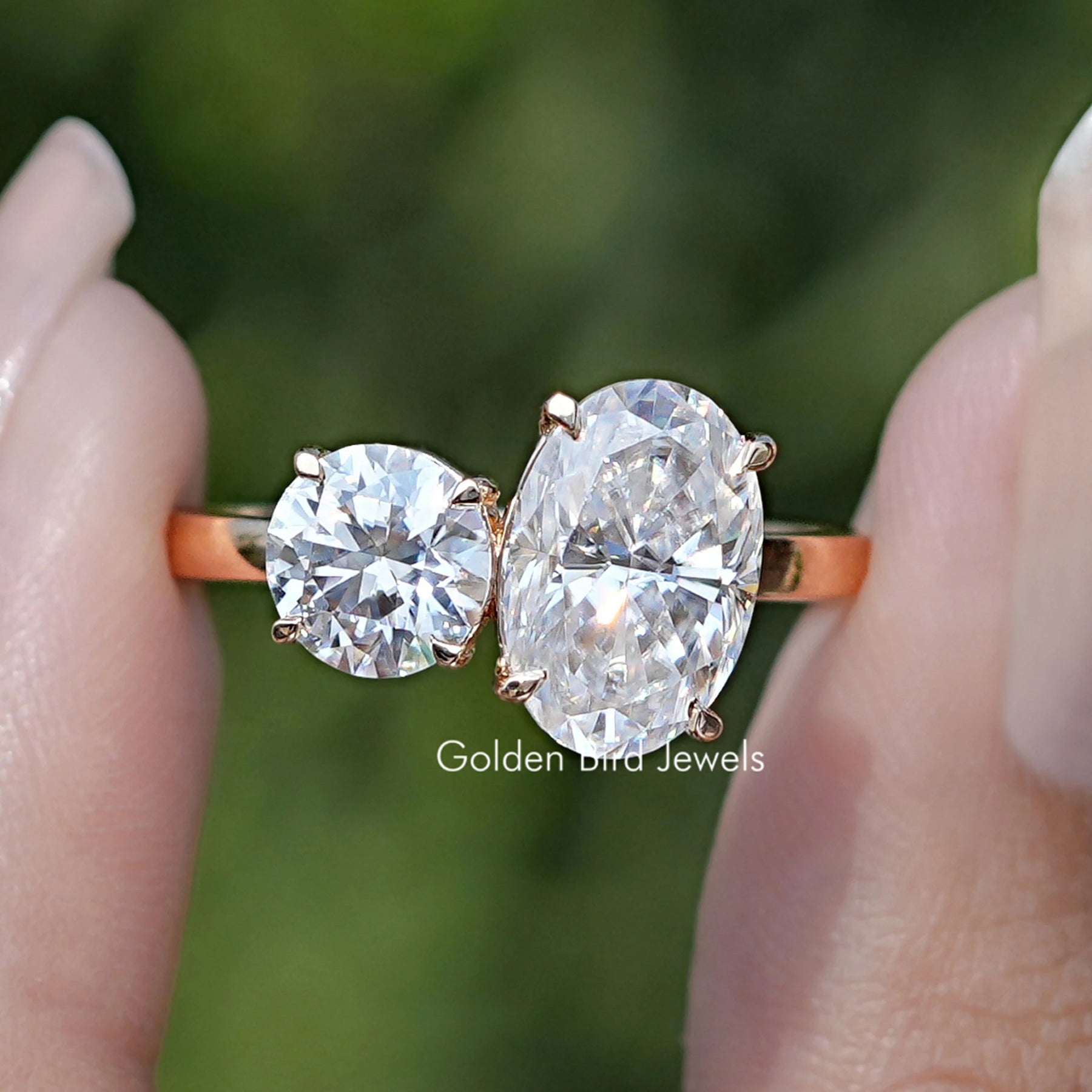 Front View Of Crushed Ice Oval And Round Cut Moissanite Toi Et Moi Ring