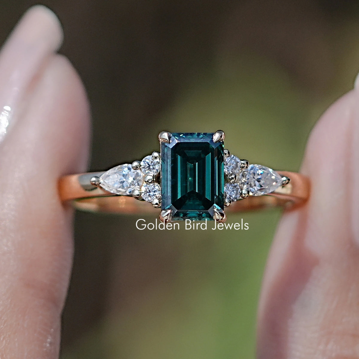 Front view of Green Emerald cut engagement ring
