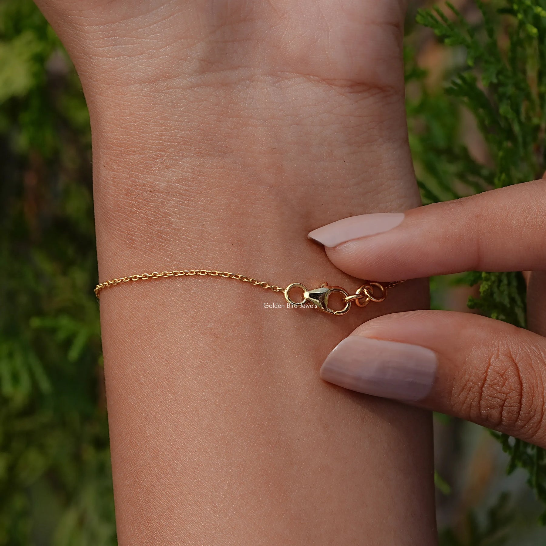 Back view of diamond heart cut halo bracelet