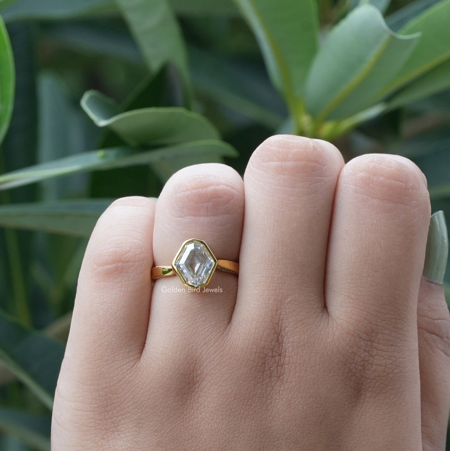 View of Moval Cut Hidden Halo Ring Set In Yellow Gold