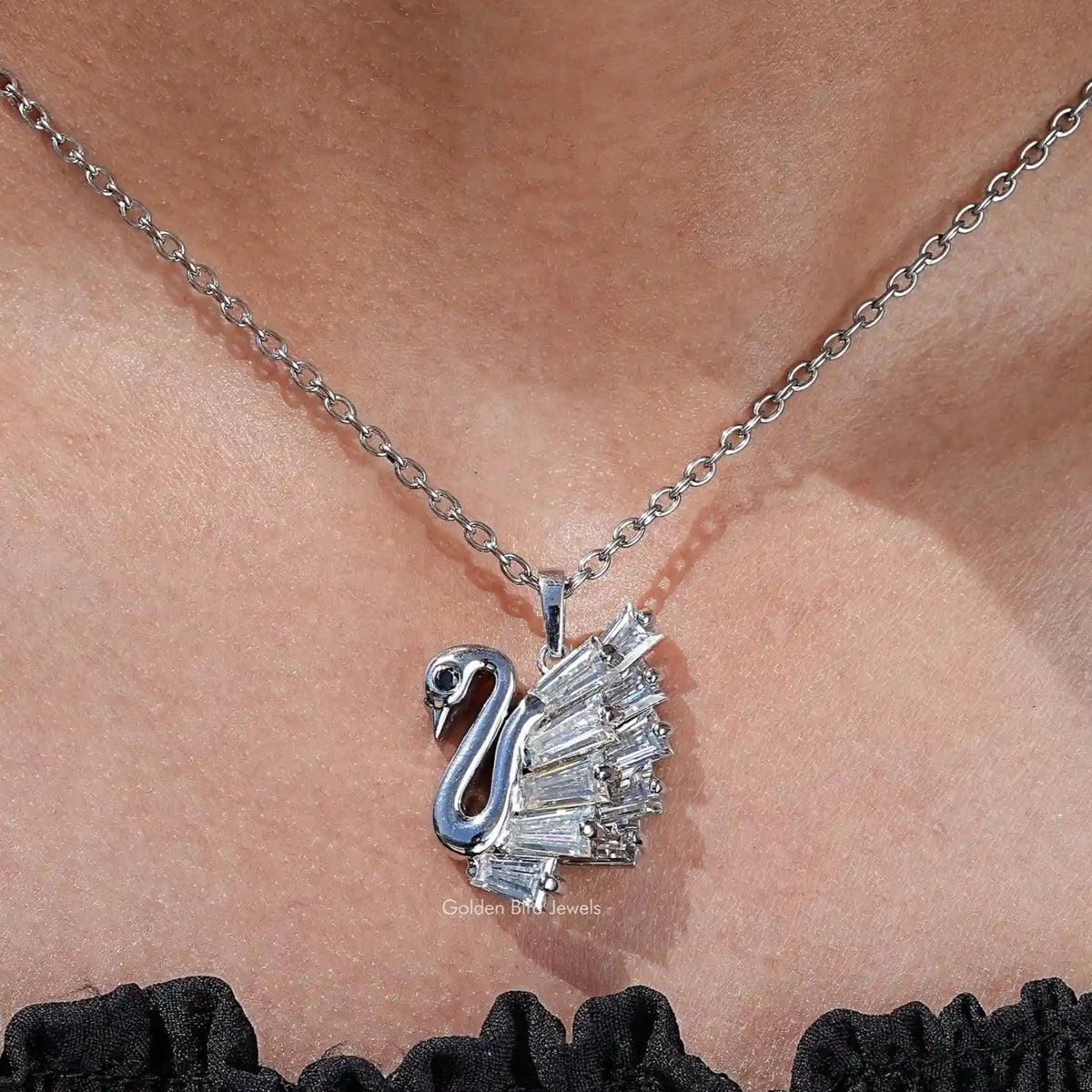 View of lab grown Moissanite Baguette cut swan pendant