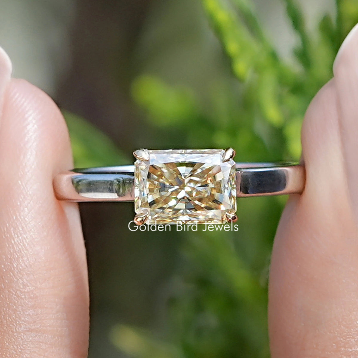 Front view of East West Yellow Radiant Moissanite Solitaire Ring