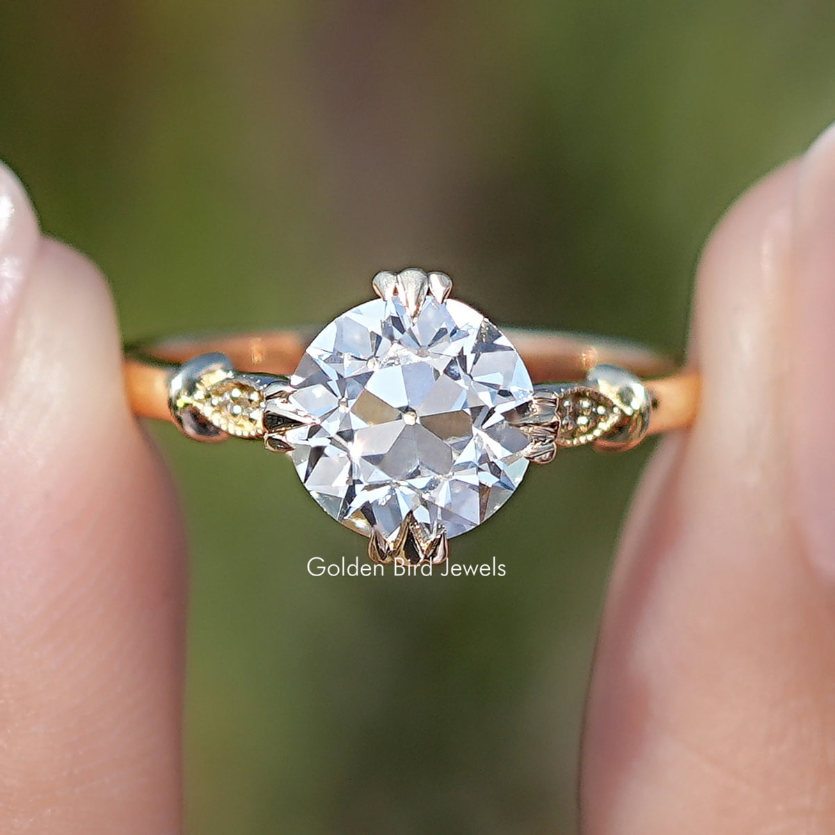 Front view of Old European Round Moissanite Accent Ring Set in two fingers