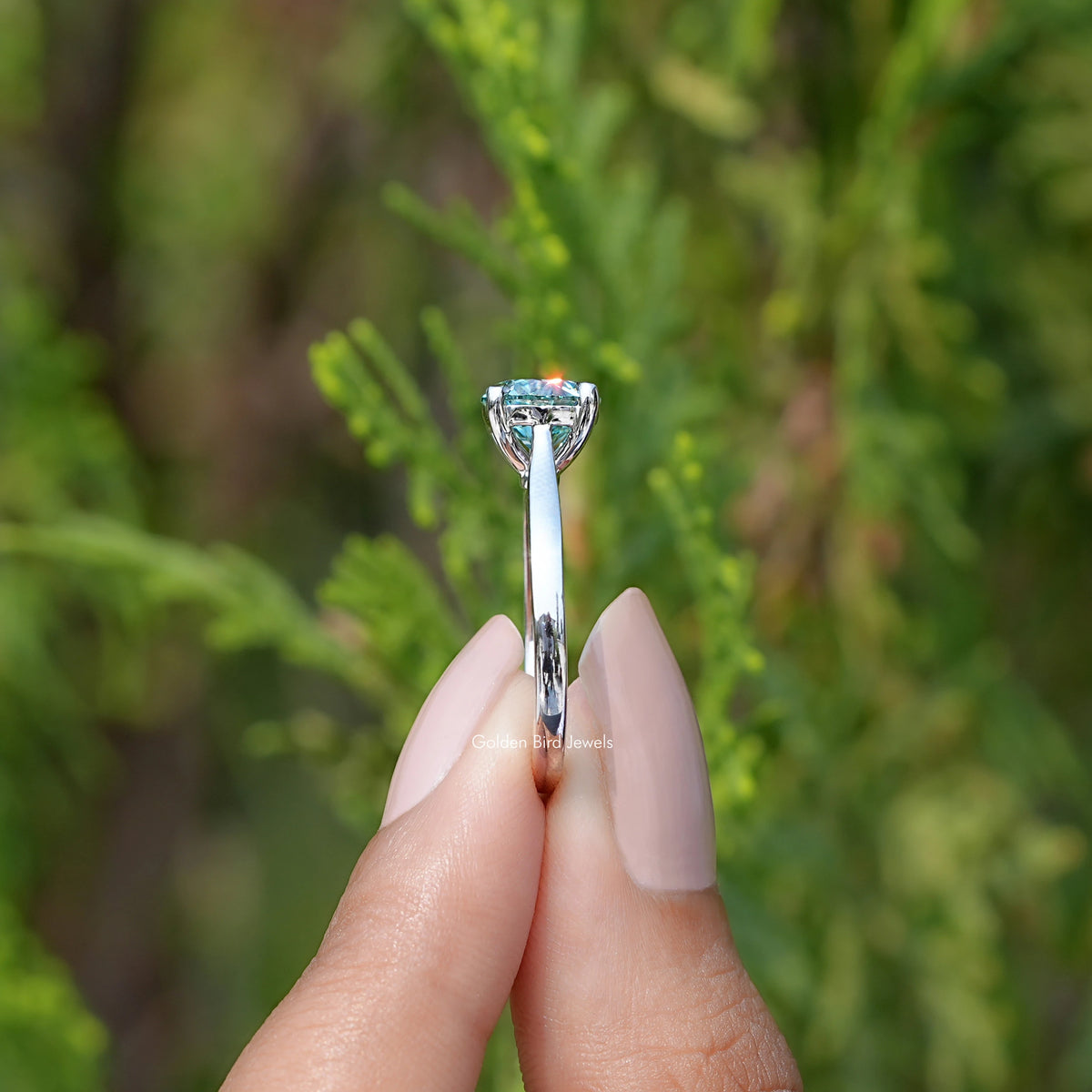 Side View of Blue Green Round moissanite Solitaire Ring