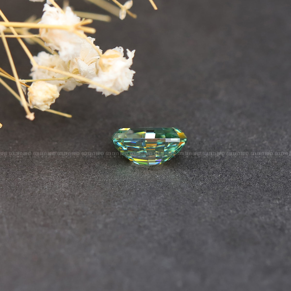 Cross View Of Blue Green Step Cut Oval Cut Loose Moissanite