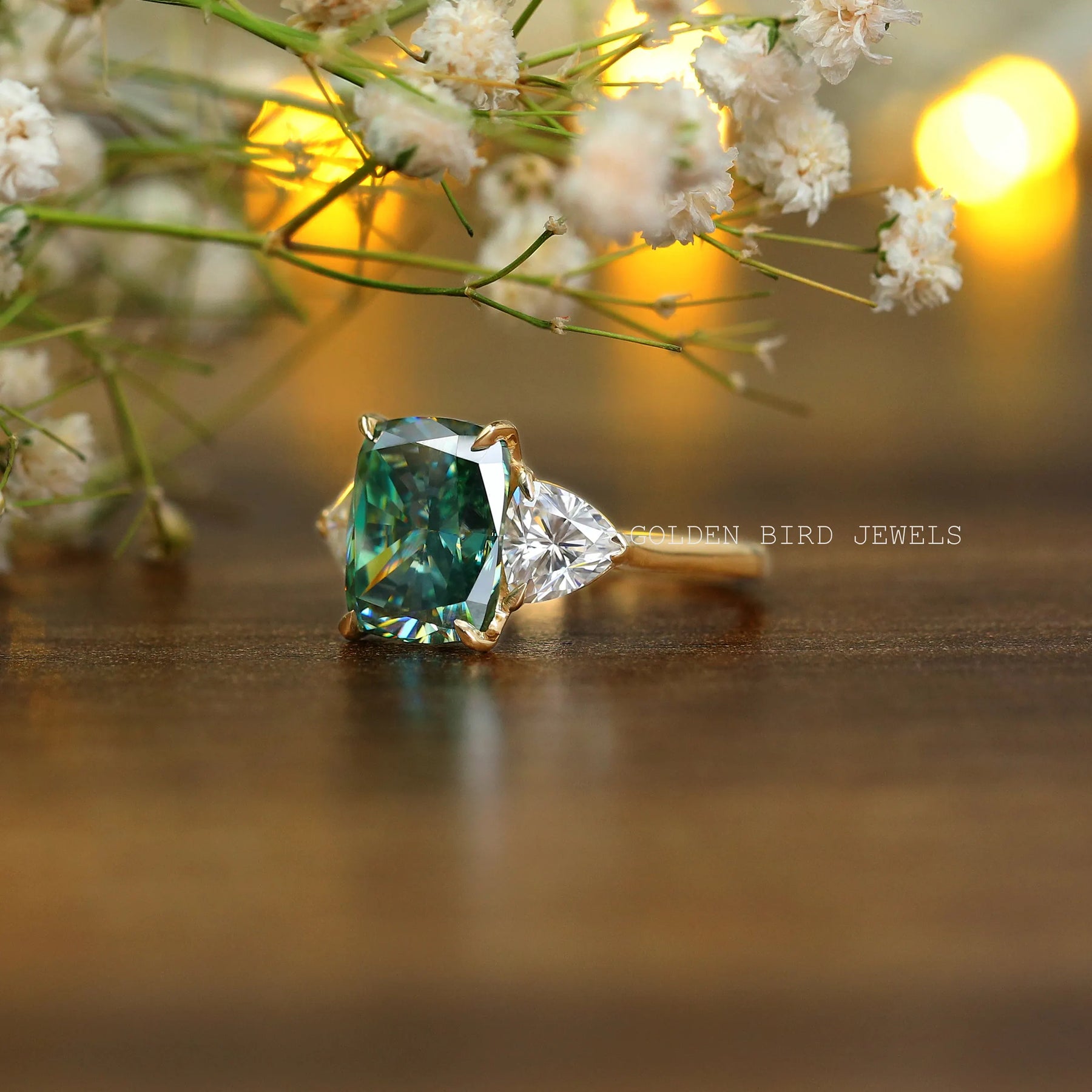 Close view of A moissanite engagement ring featuring a cushion shape stone