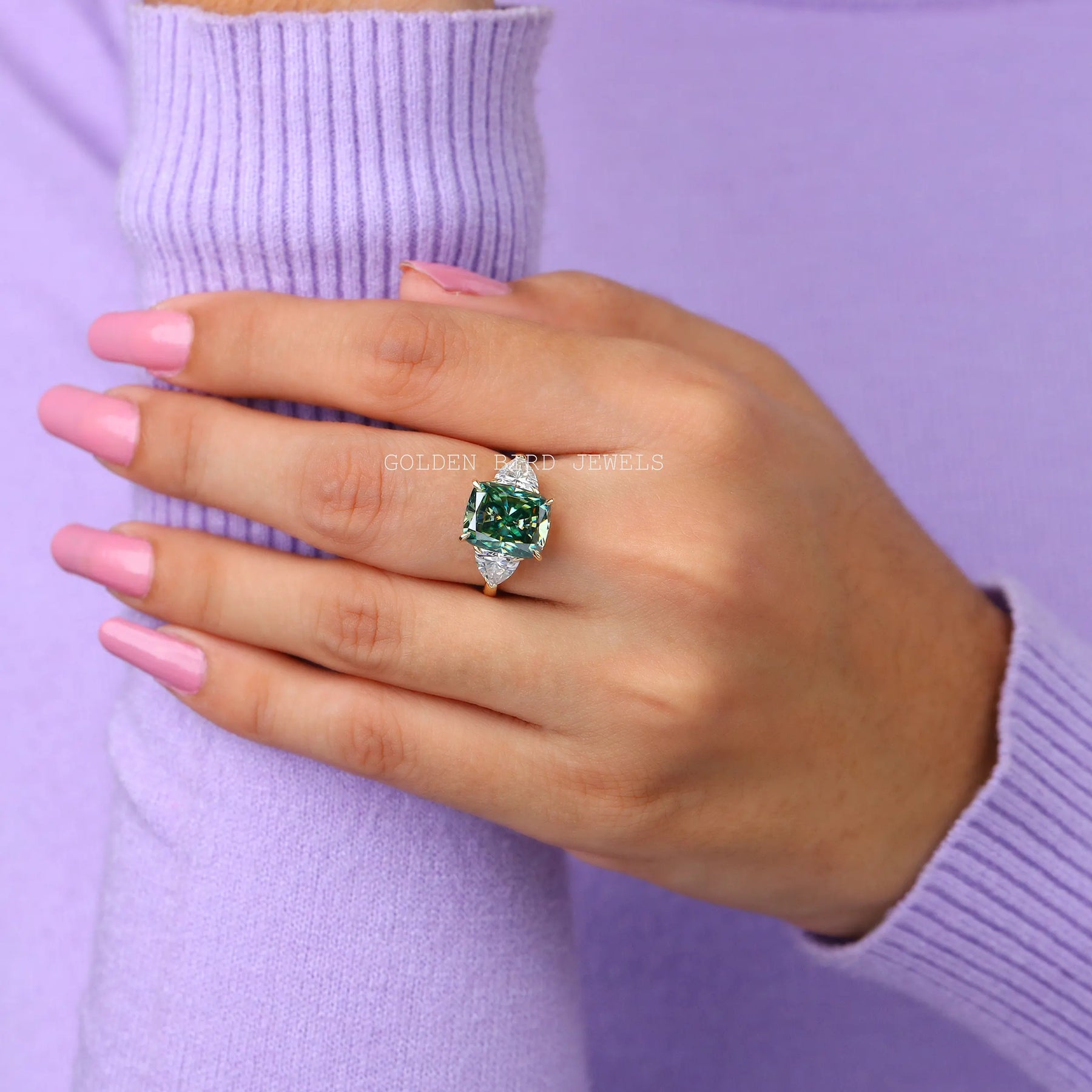 View of halo blue green moissanite ring