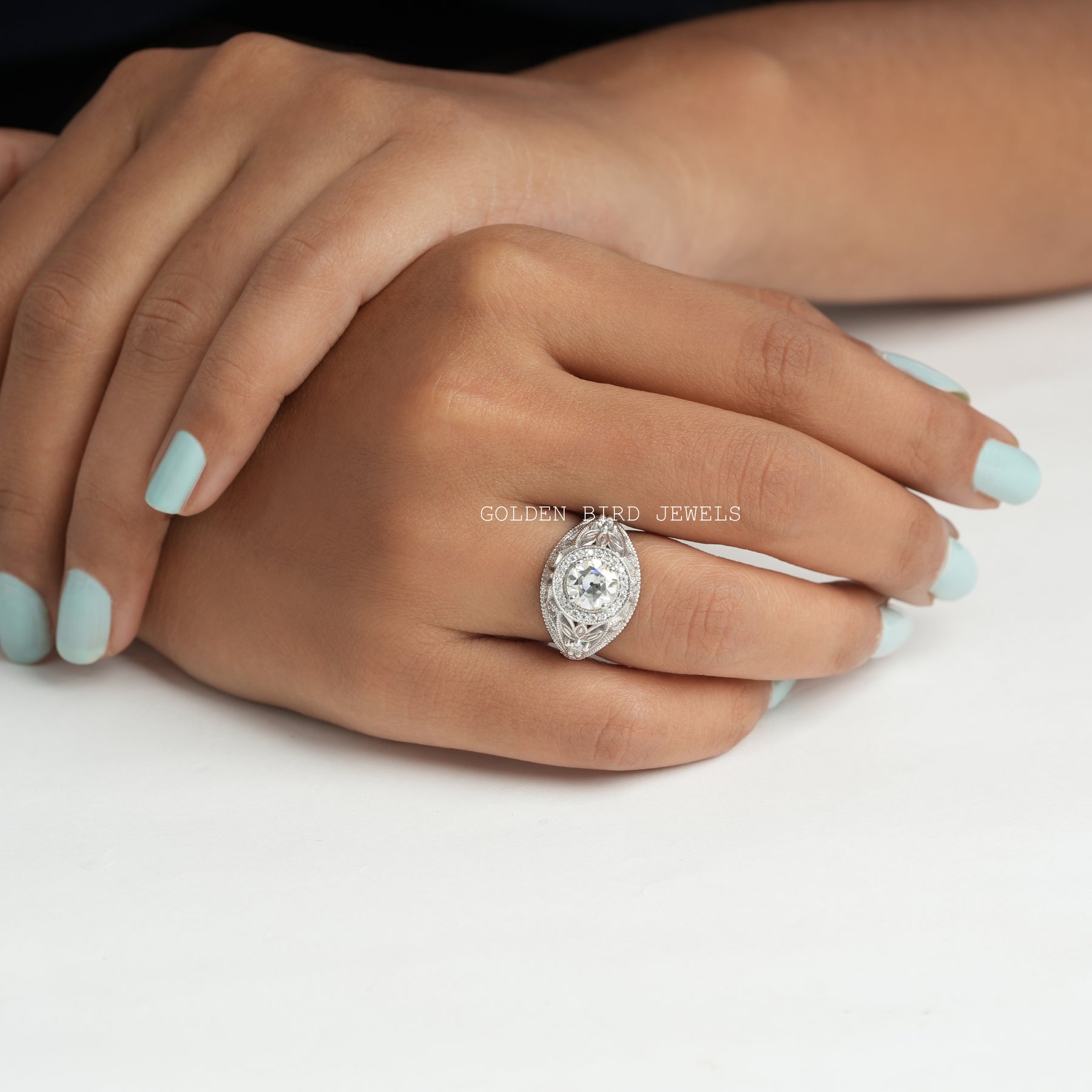 Side View Of Old European Cut Round Moissanite Ring With Four Prong Setting