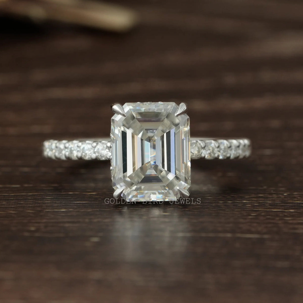 View of Emerald Cut Moissanite Solitaire Engagement Ring In White Gold