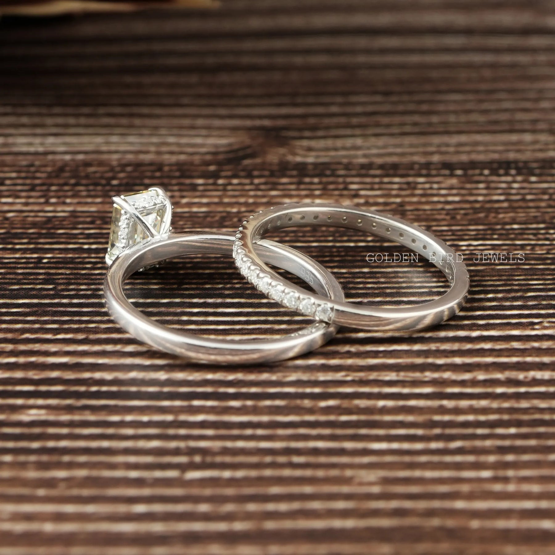 View of Emerald Cut Engagement Ring Set In White Gold