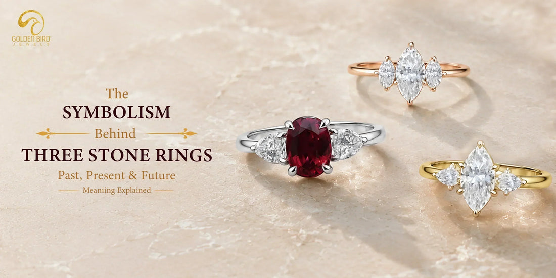 Collection of three-stone gemstone and diamond rings in white gold, rose gold, and yellow gold settings