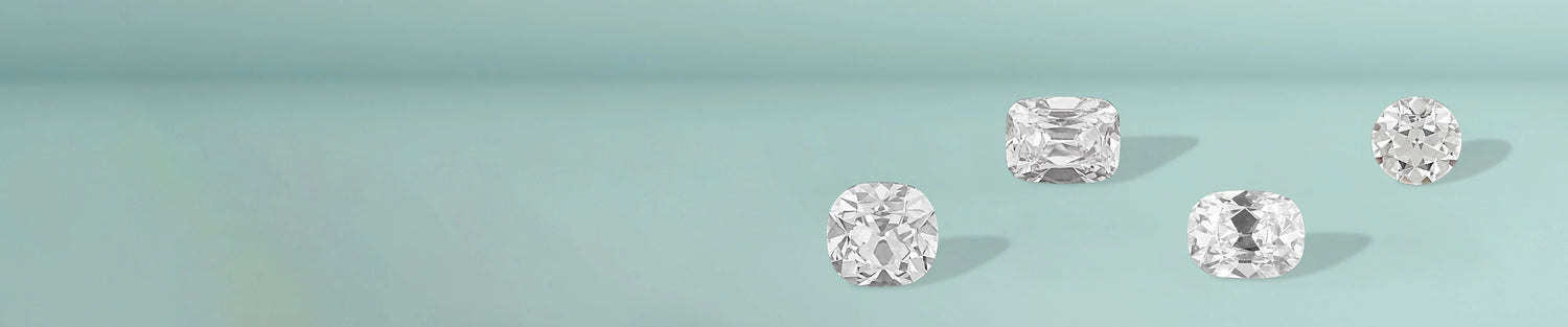 Vintage old cut diamond ring and bracelet shown in elegant flat lay