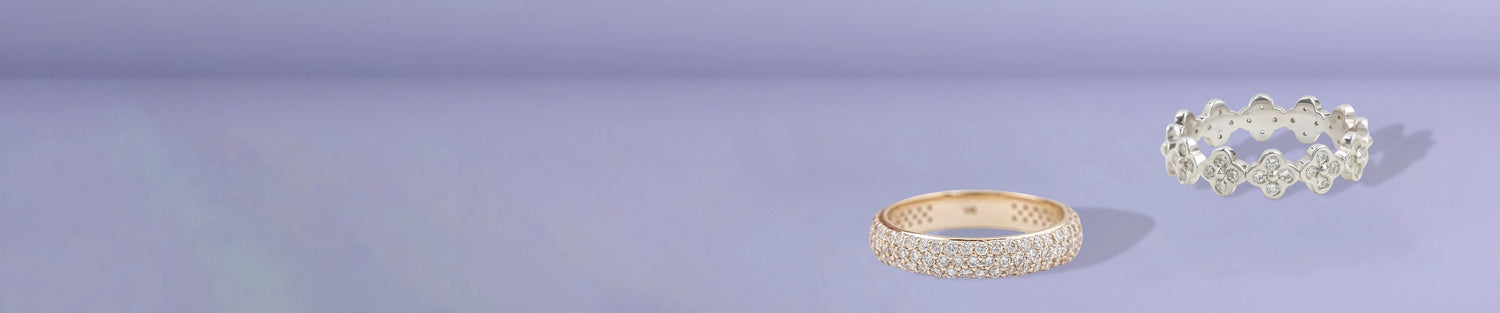 Sparkling pavé gold ring and sculpted silver floral band with diamonds