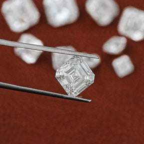 Tweezer holding the Asscher Cut Lab Loose Diamond