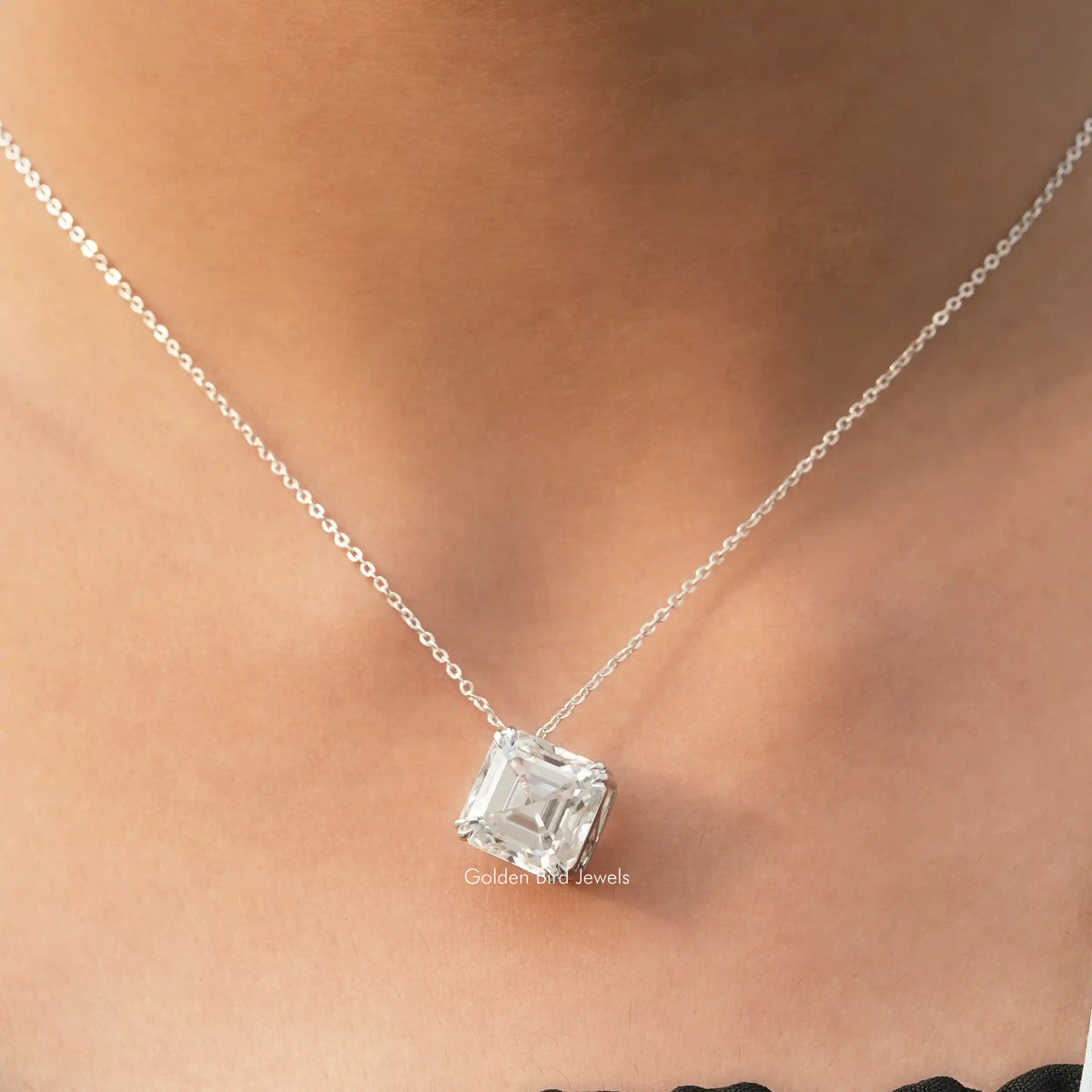 View of colorless asscher moissanite solitaire pendant 