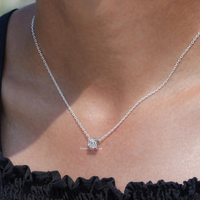 In neck view of Asscher cut diamond halo pendant 