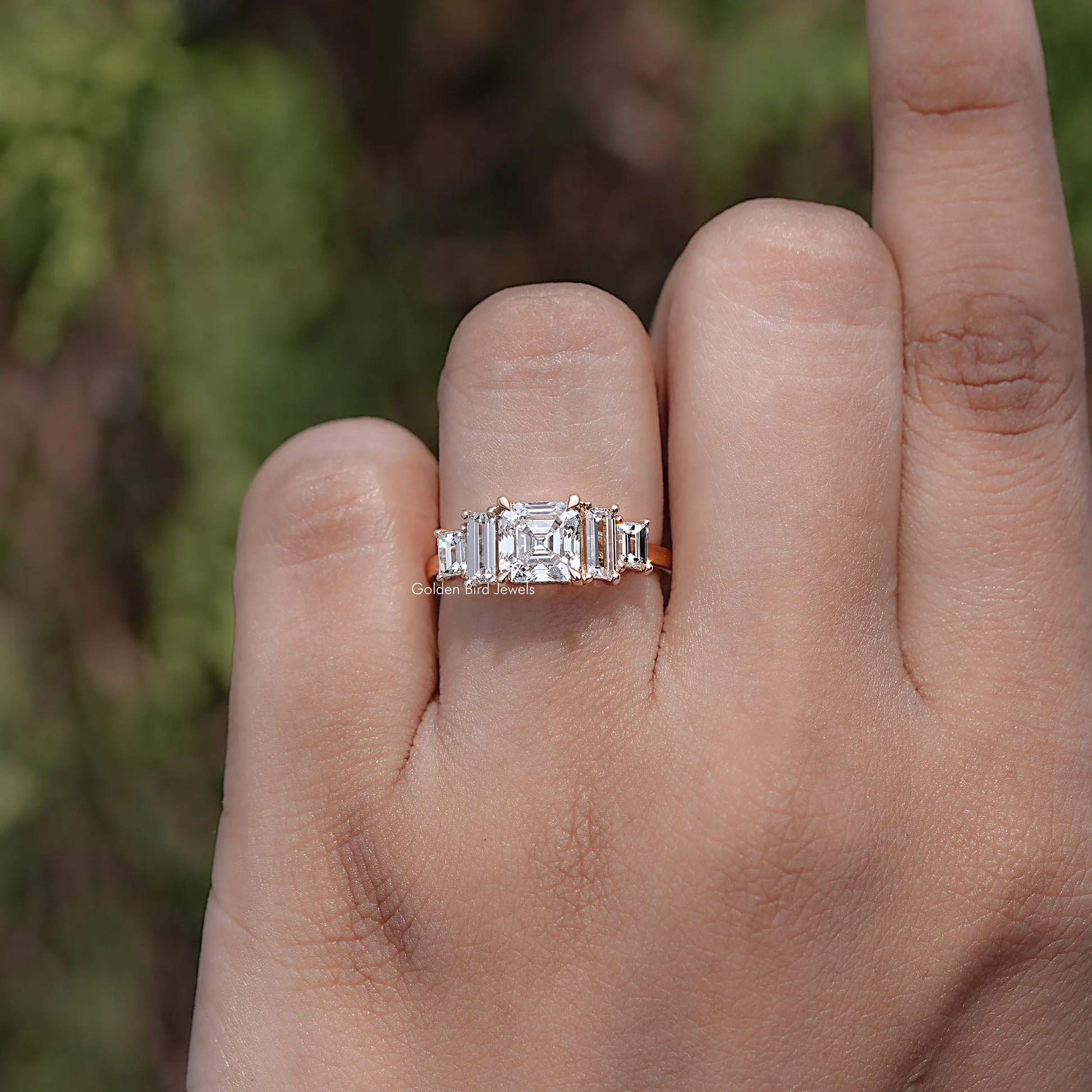 Front view of Asscher Cut Diamond Five Stone Engagement Ring