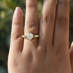 View of three stone asscher cut diamond ring In Finger
