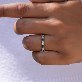 View of Colorless Round And Baguette Wedding Band In White Gold